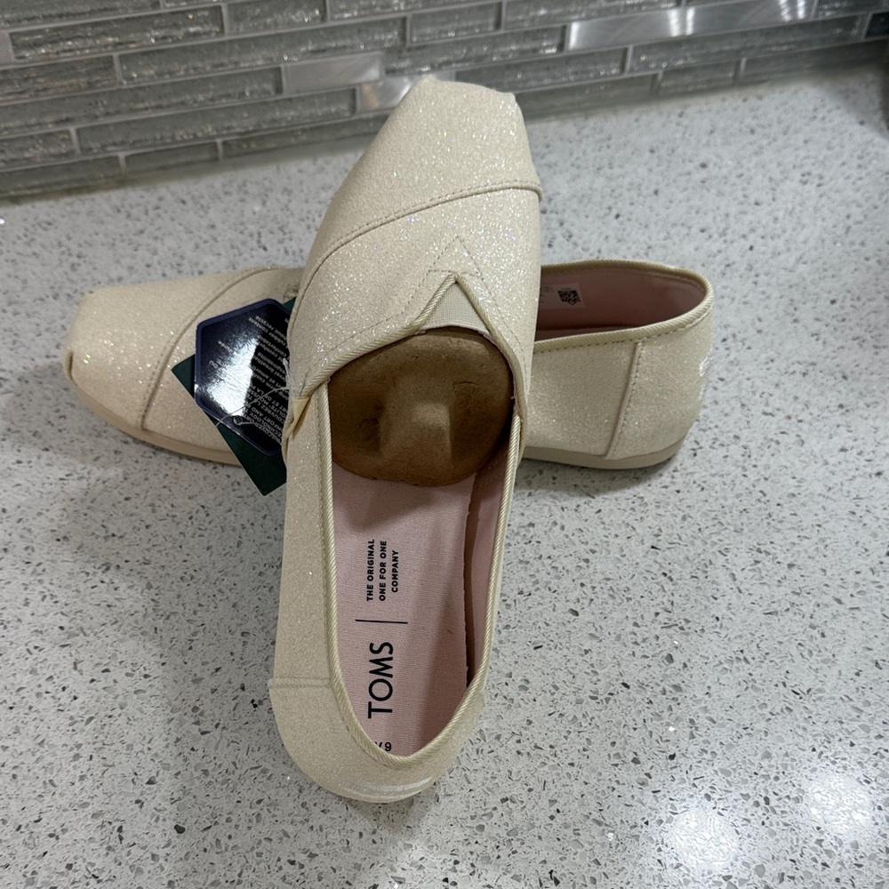 Toms Women's Glitter Cream Slip-On Flats